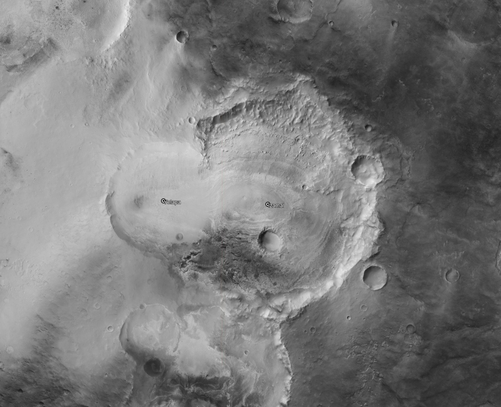 Imagen satelital en blanco y negro de la superficie de Marte con dos cráteres señalados, Yelapa a la izquierda e Izamal a la derecha